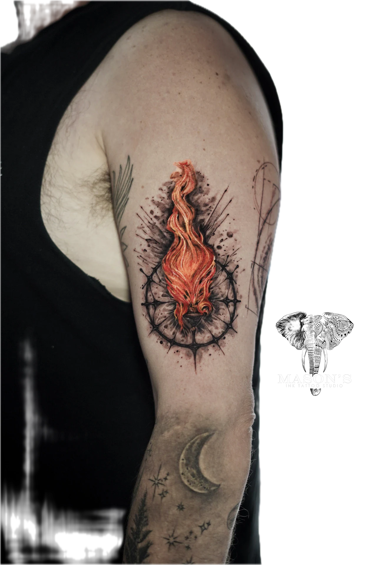 Color Fire Tattoo Design: a flame within a geometric pattern on an upper arm