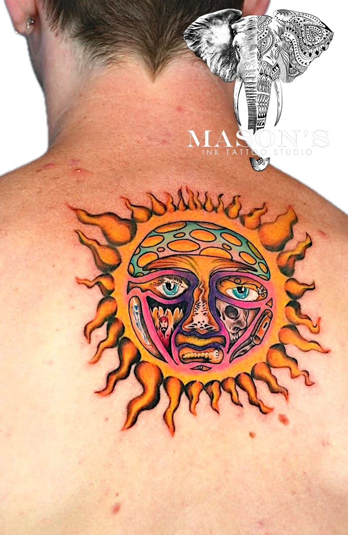 Neo Traditional Sun Face tattoo by Mason's Ink Tattoo Studio, Bali