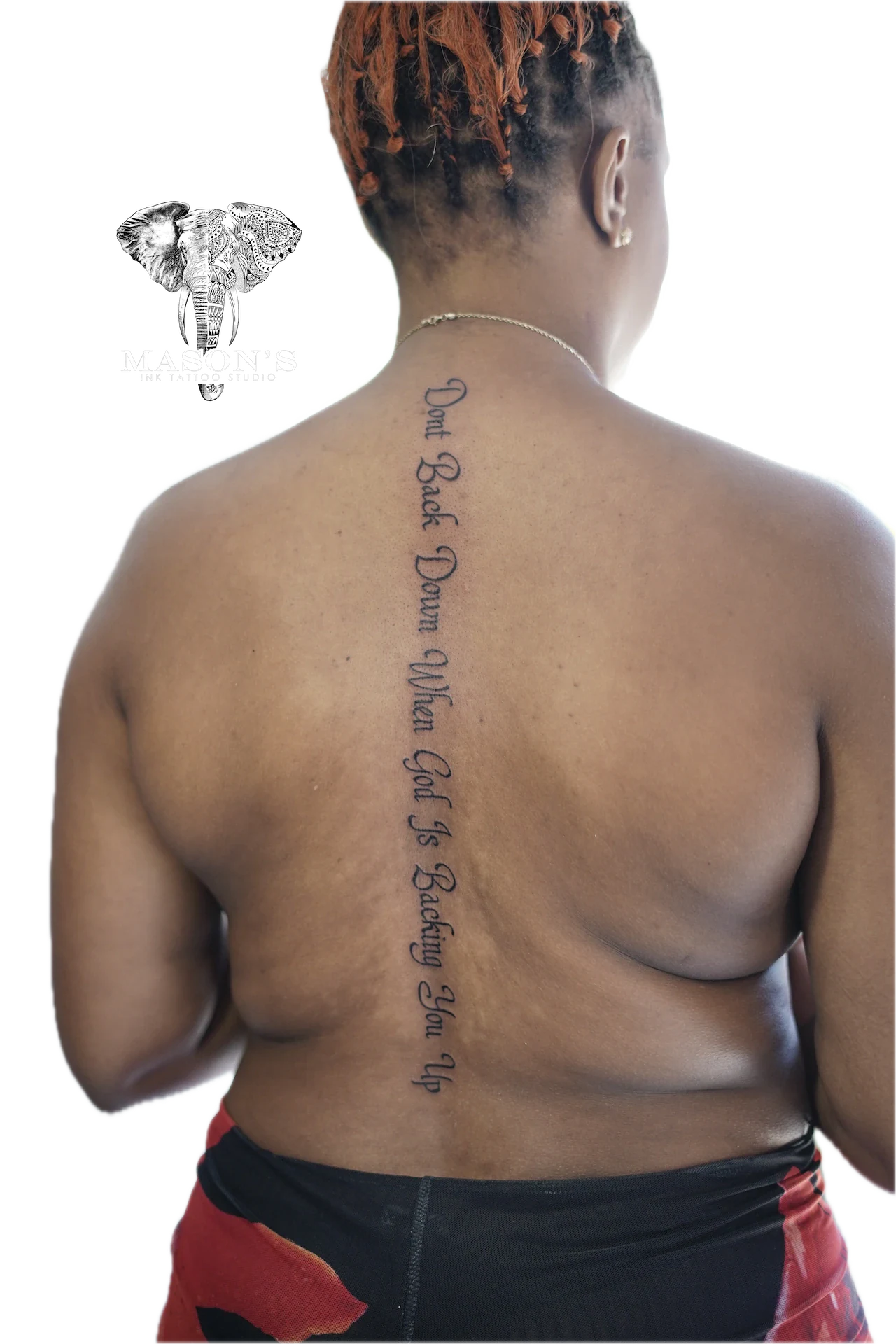 Fine Line Script Tattoo Design: a long vertical script tattoo on the back