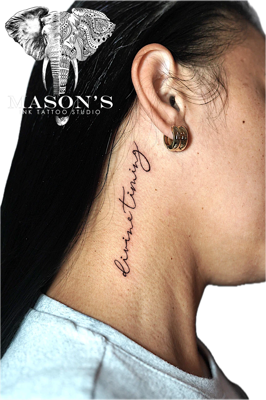 Fine Line Script Tattoo Design: Minimal black and grey lettering on the neck