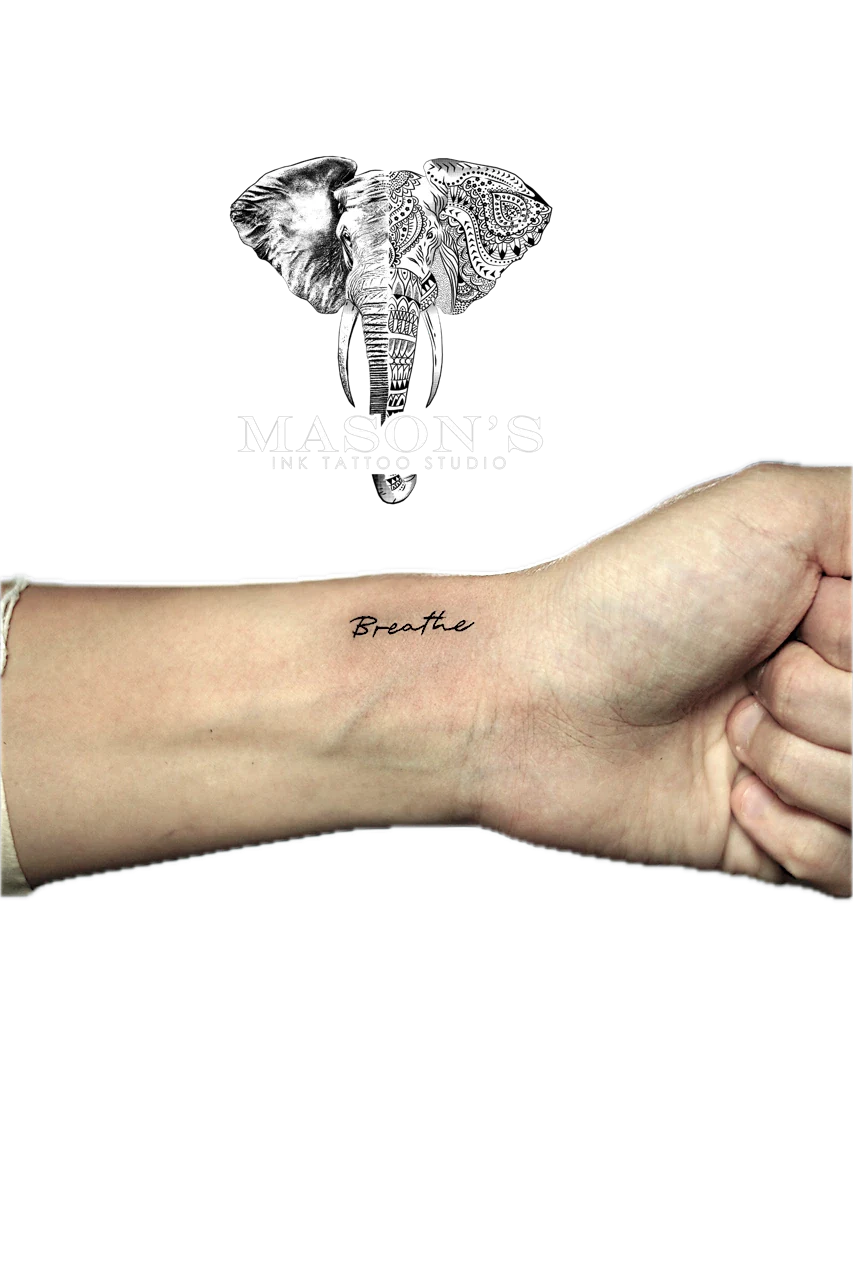 Fine Line Script Tattoo Design: Minimal black and grey lettering tattoo on the forearm