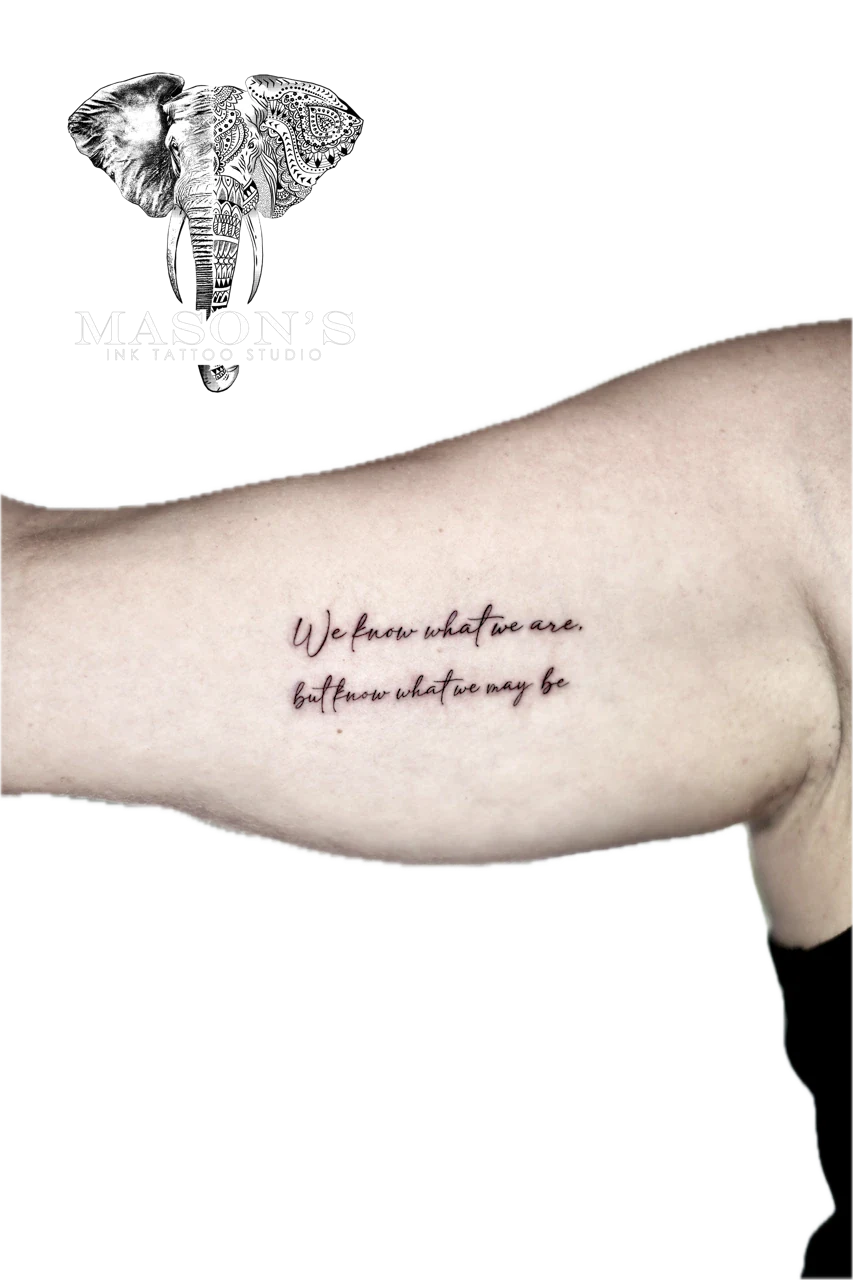 Fine Line Script Tattoo Design: Minimal script lettering on the ribs