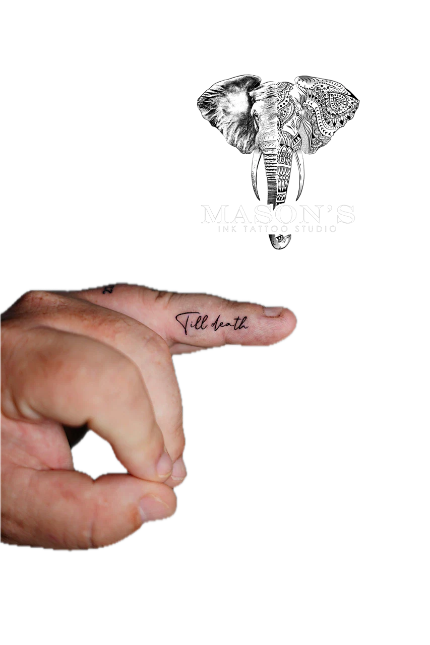 Fine Line Script Tattoo Design: Small black and grey lettering tattoo on a finger