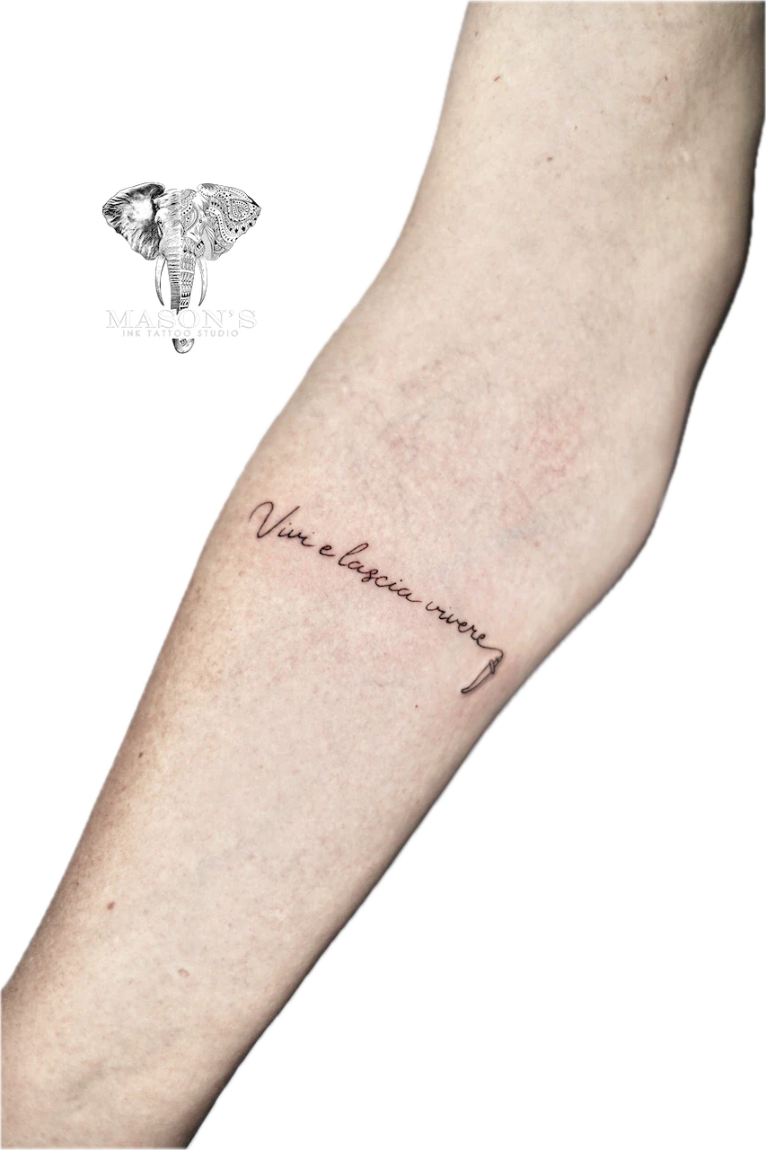 Fine Line Script Tattoo Design: Minimal script lettering with an arrow on a calf