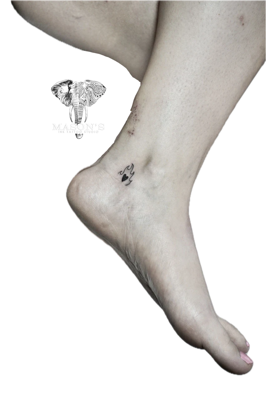 Fine Line Love Tattoo Design: a small heart and bird tattoo on the ankle