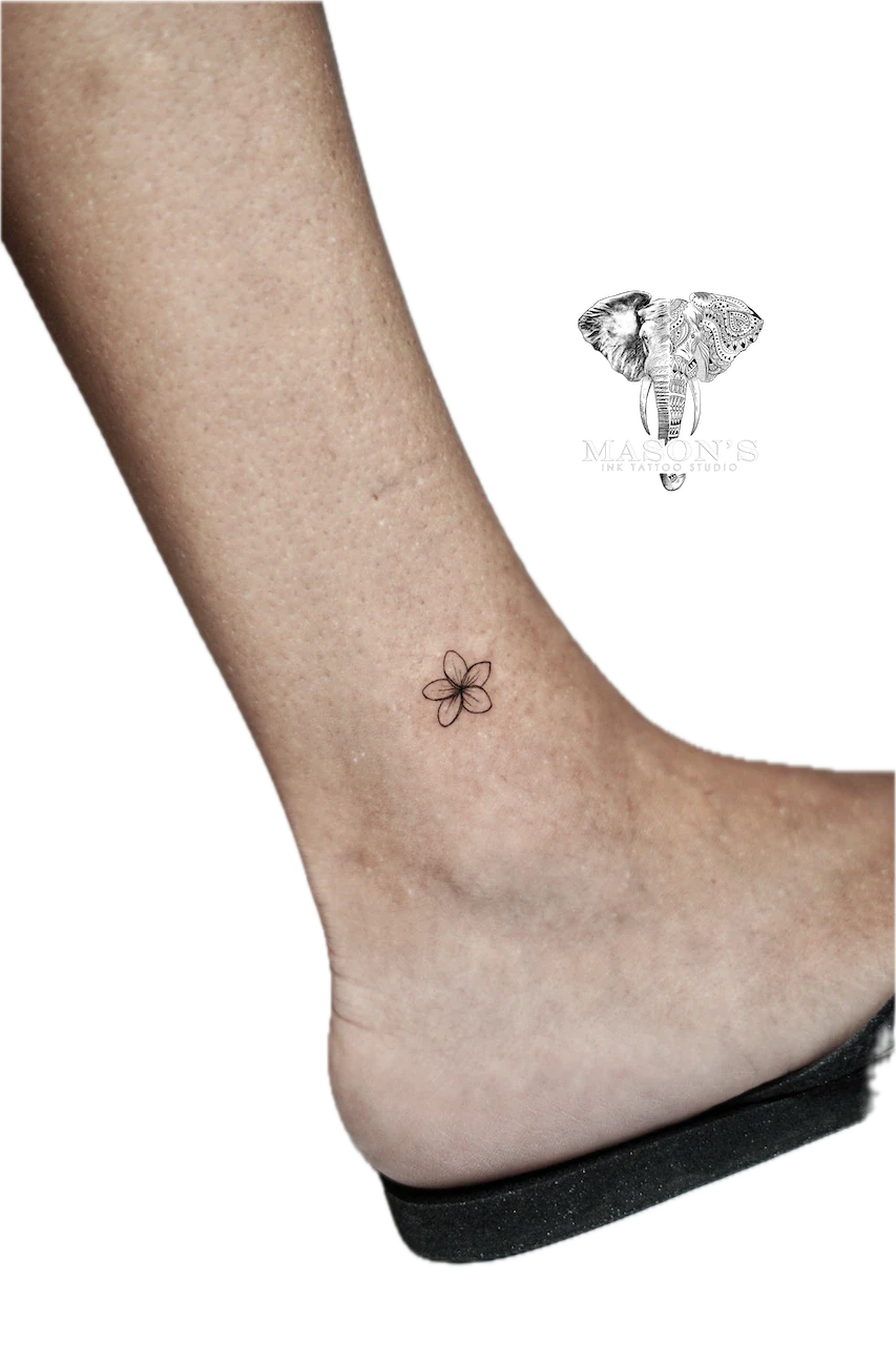 Fine Line Floral Flower Tattoo Design: a small, minimalist flower tattoo on the ankle