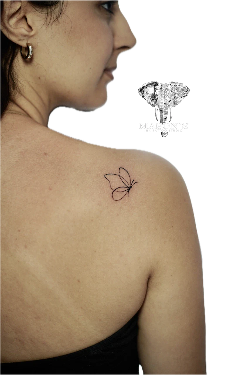 Fine Line Butterfly Tattoo Design: a delicate butterfly tattoo on the shoulder