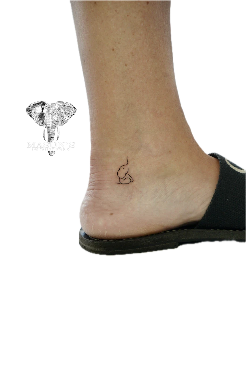 Fine Line Elephant Tattoo Design: a small black and grey snail on the ankle