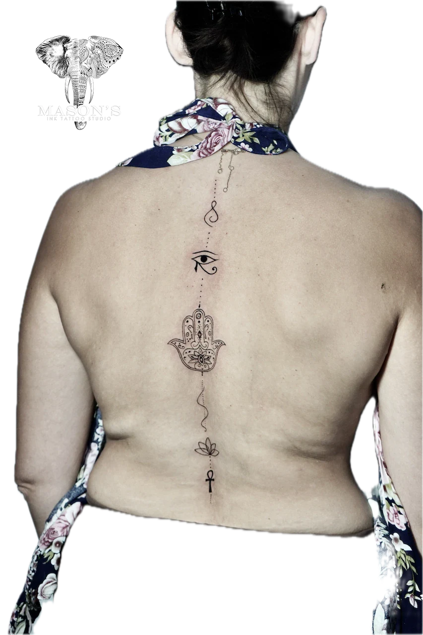 Fine Line Symbol Tattoo Design: Spiritual symbols aligned vertically on the back