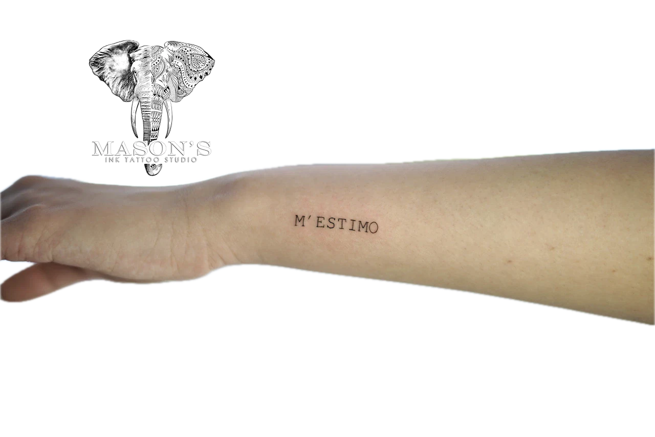 Fine Line Script Tattoo Design: Small black and grey lettering on the forearm