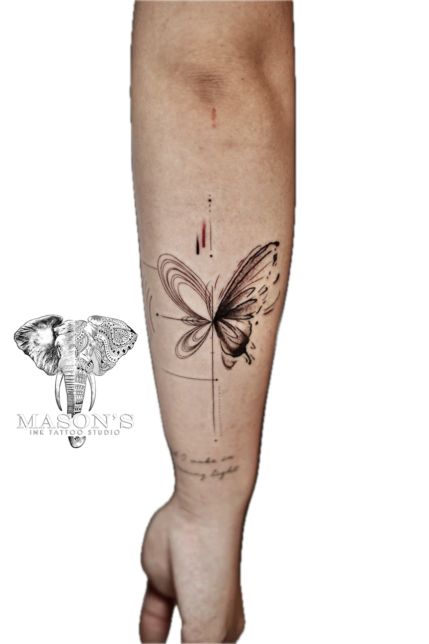 Fine Line Butterfly Tattoo Design: a minimalist butterfly with swirls and lines on a calf