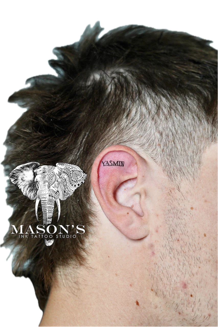 Elegant Fine Line Script Ear Tattoo Design - Fineline tattoo by Mason's Ink Tattoo Studio, Bali