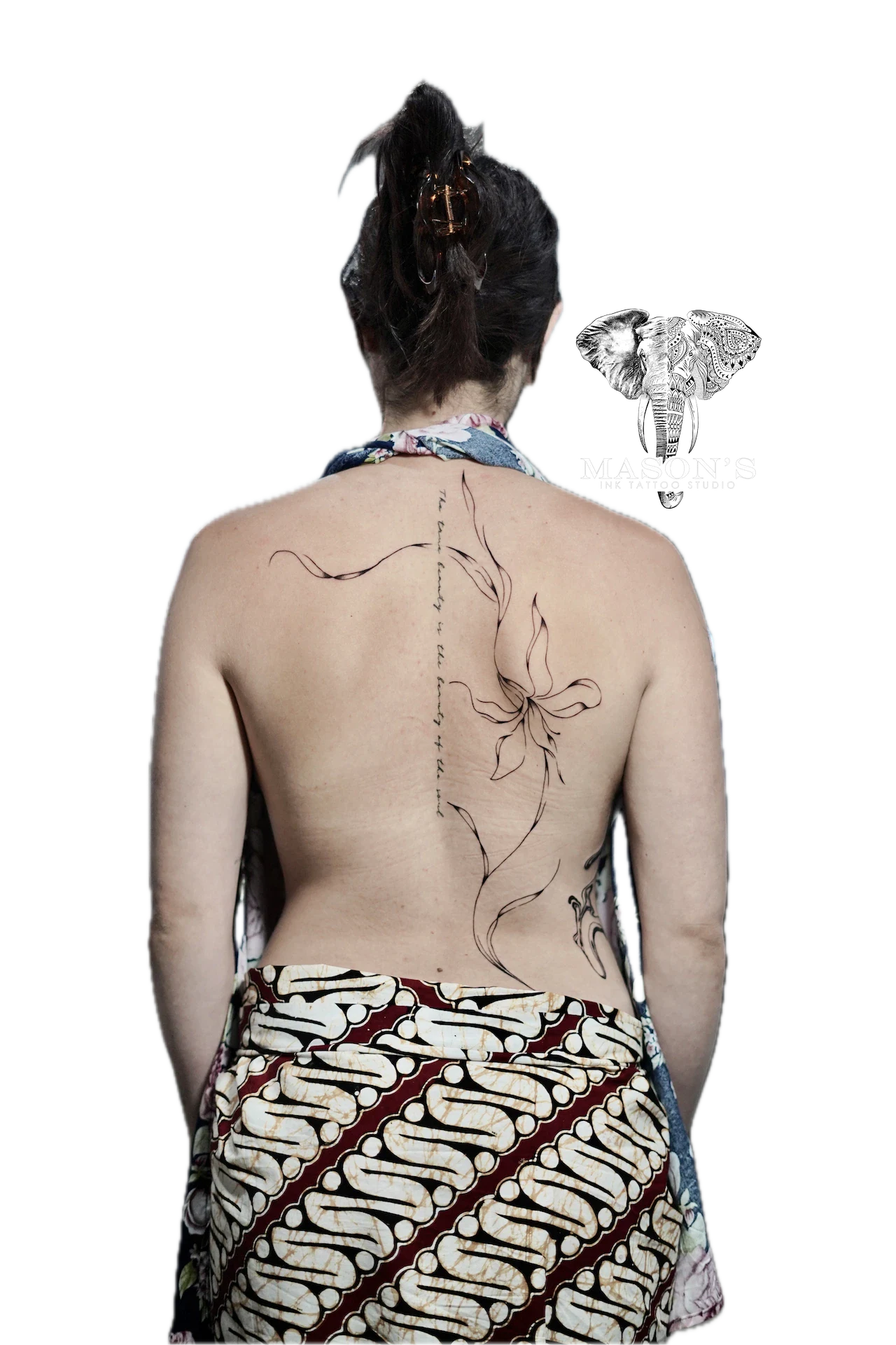 Floral Fineline Tattoo Design: a large minimalist flower vine tattoo on the back