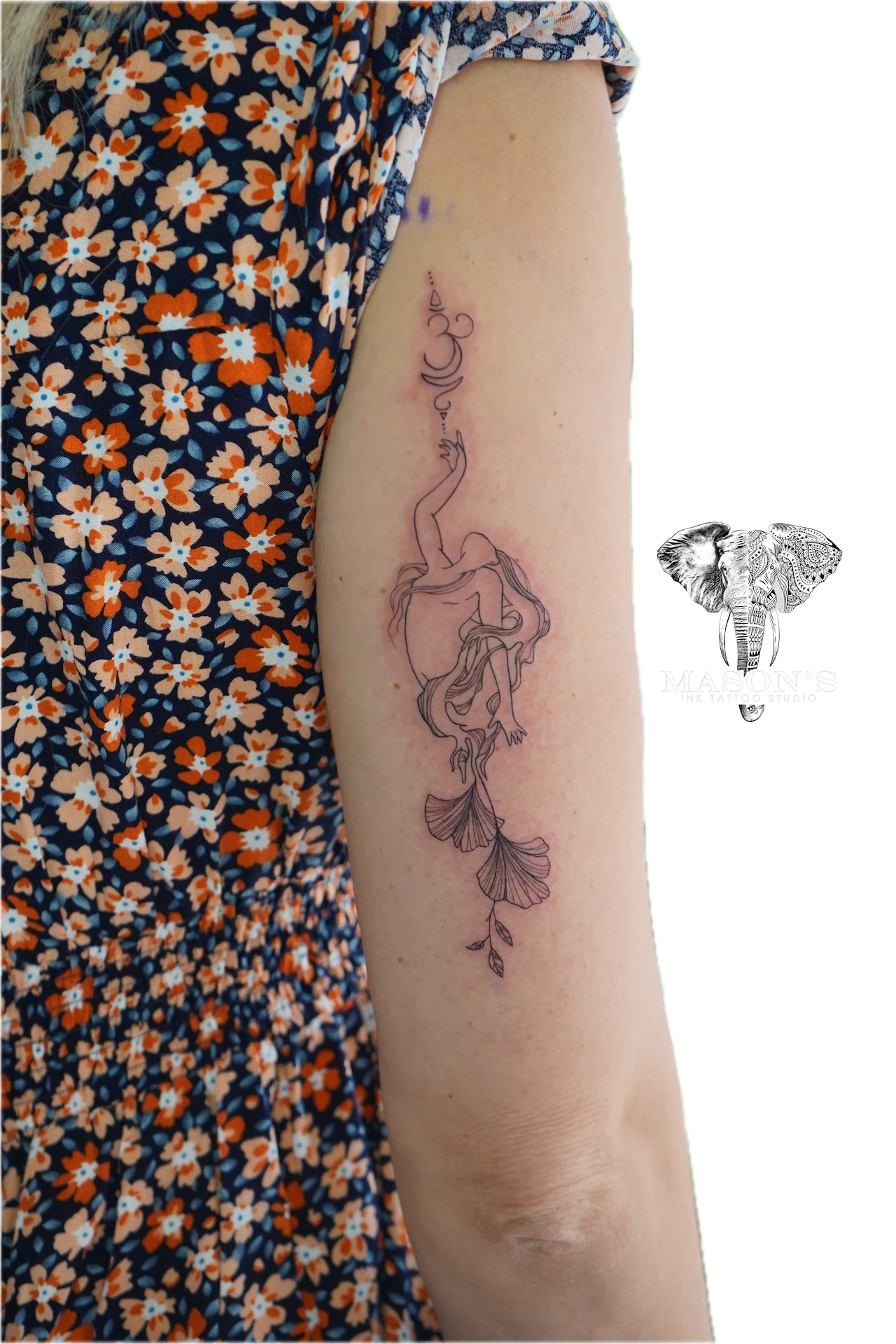 Fineline Leaf Tattoo Design: a mermaid with flowing hair and a shell tail on a forearm