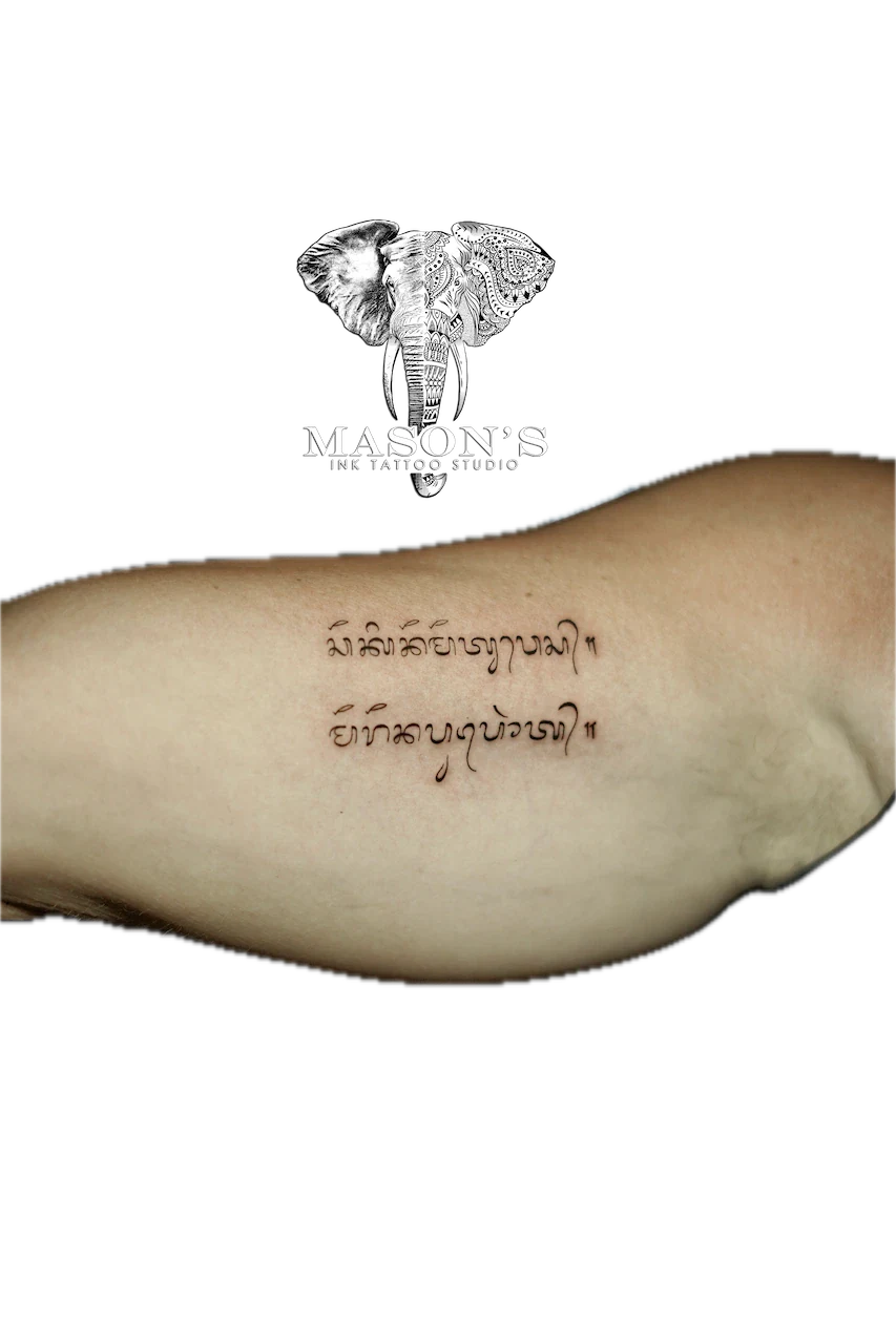 Fine Line Aksara Script Tattoo Design: Thai lettering tattoo on the forearm