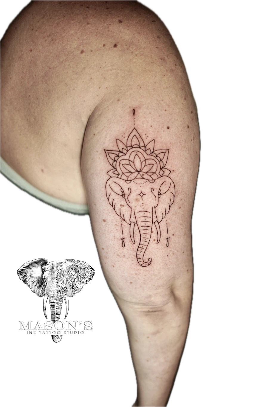Fine Line Elephant Tattoo Design: an elephant with a mandala and lotus on the thigh