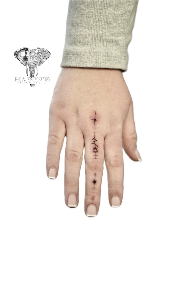 Fine Line Floral Finger Tattoo - Fineline tattoo by Mason's Ink Tattoo Studio, Bali