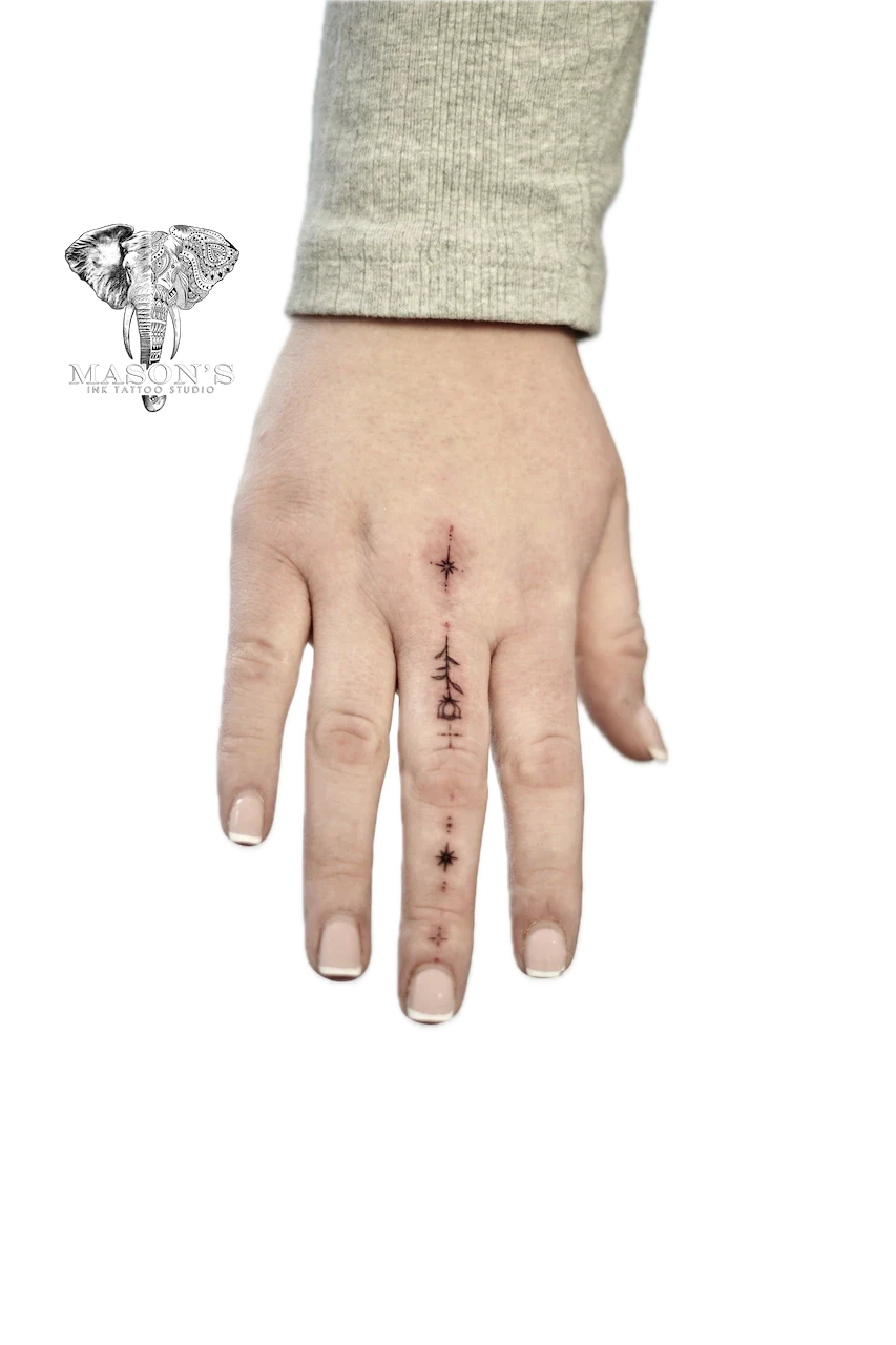 Fine Line Floral Finger Tattoo - Fineline tattoo by Mason's Ink Tattoo Studio, Bali