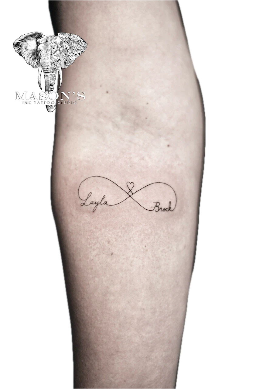 Fine Line Infinity Script Tattoo Design: Minimal infinity symbol with names and heart on calf