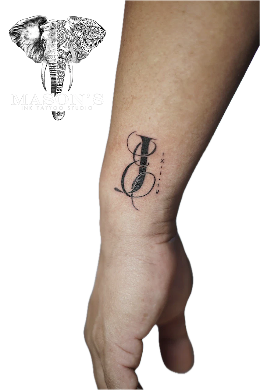 Fine Line Linework Script Tattoo Design: Minimal black and grey lettering tattoo on the forearm
