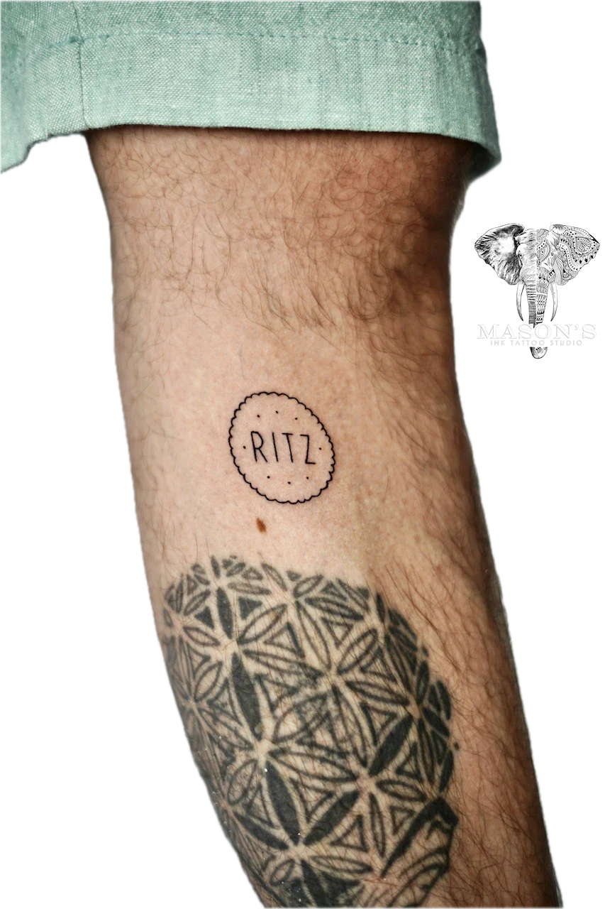 Fine Line Logo Script Tattoo Design: Small minimalist lettering and geometric pattern on the forearm