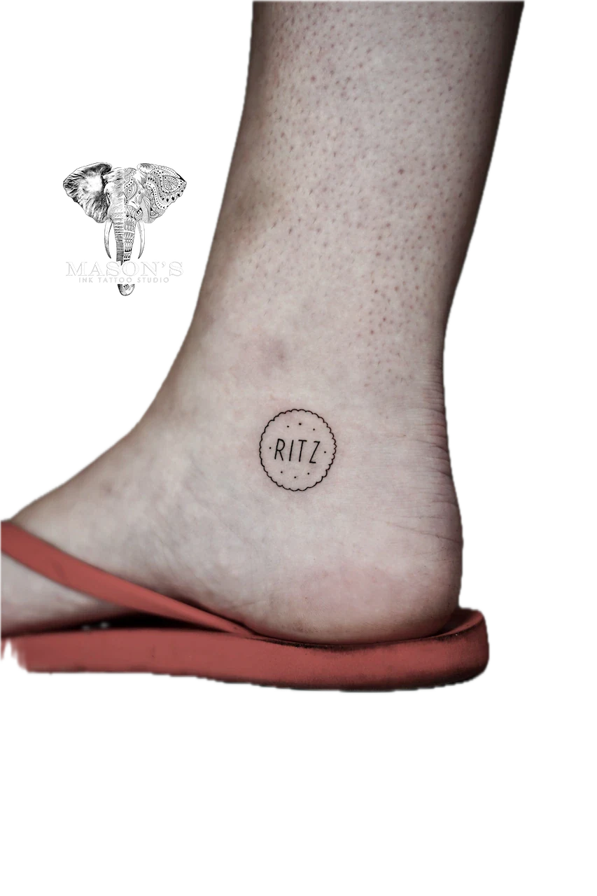 Fine Line Logo Script Tattoo Design: Small circular lettering tattoo on the ankle