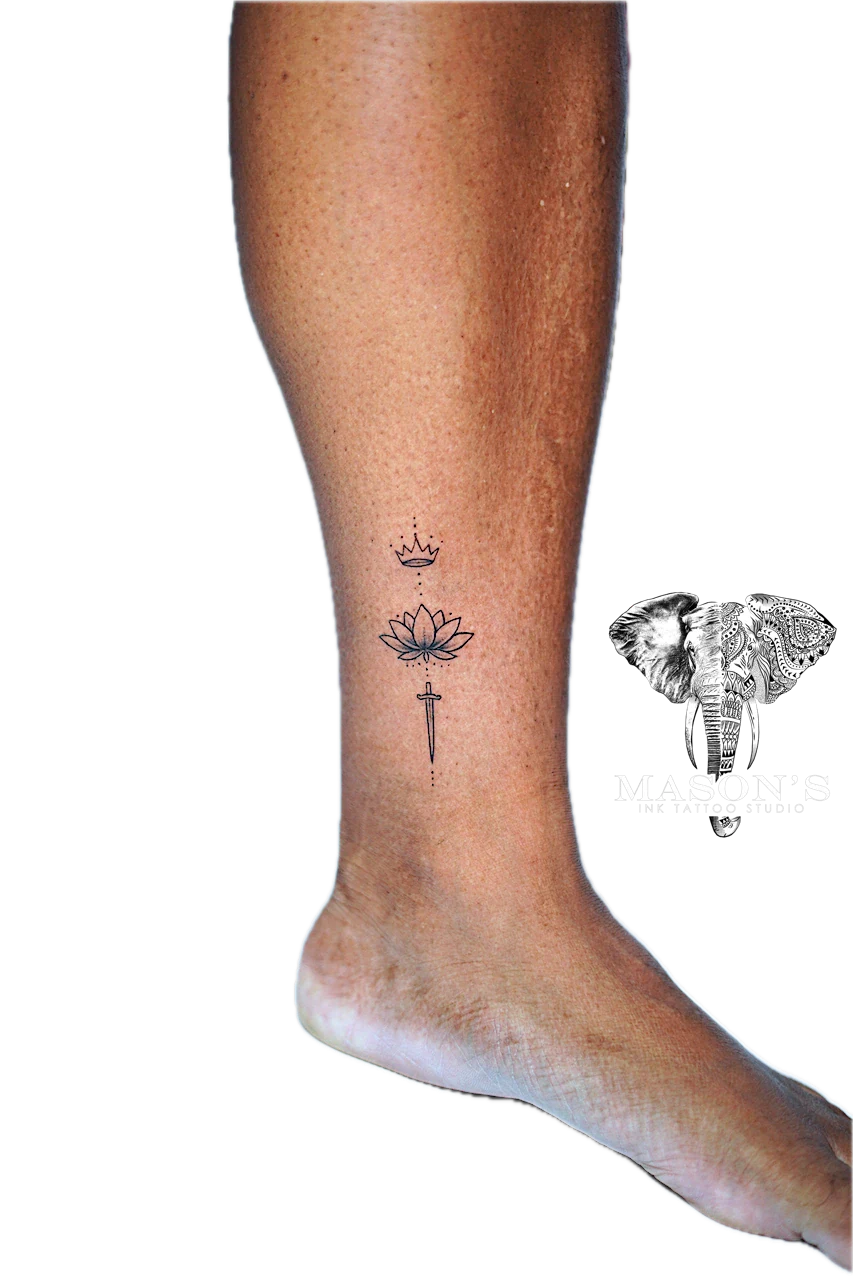 Fine Line Lotus Sword and Crown Tattoo Design by Mason's Ink Tattoo Studio, Bali