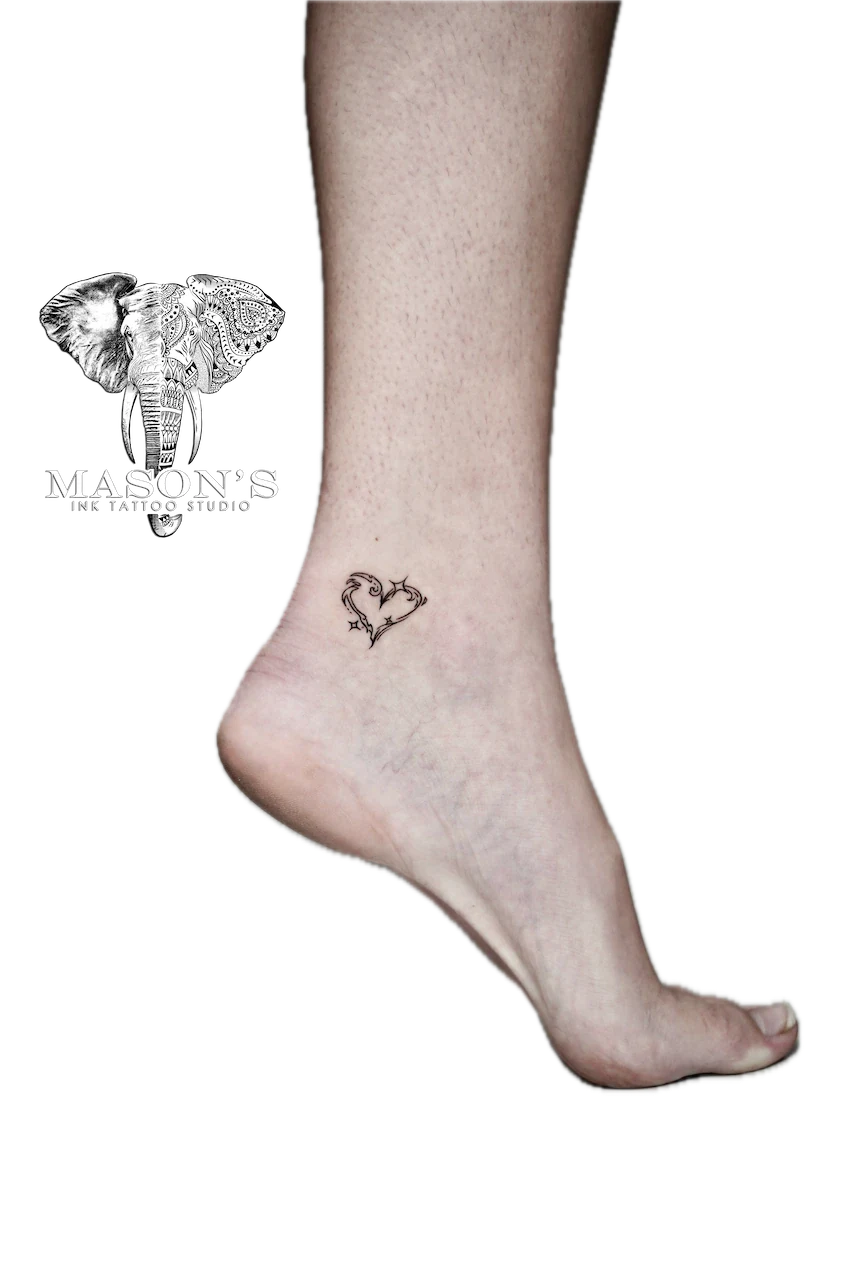 Fine Line Love Script Tattoo Design: Small heart and bird tattoo on the ankle