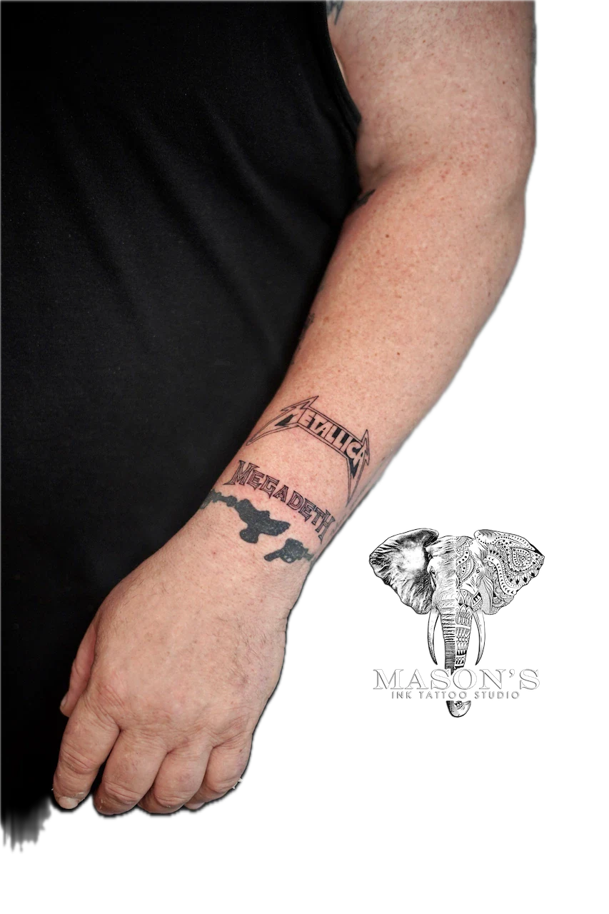 Fine Line Rock Metal Script Tattoo Design: a Megadeth logo and bat tattoo on the forearm