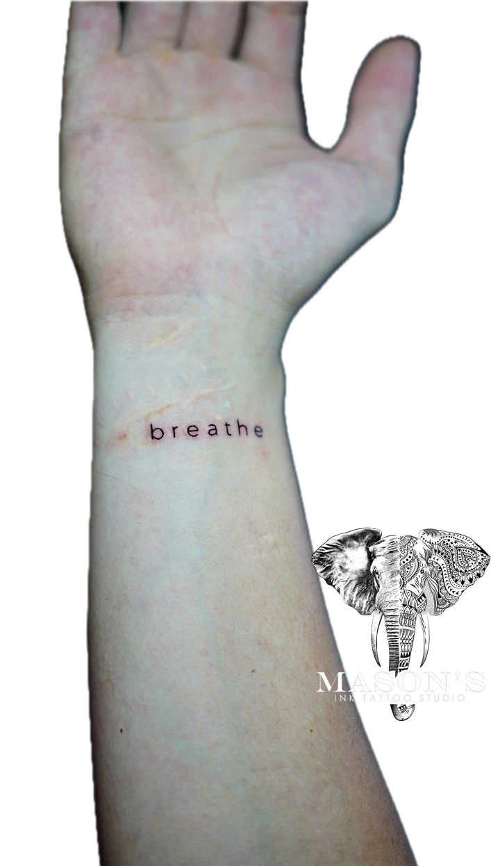 Fine Line Script BREATHE Tattoo Design by Mason's Ink Tattoo Studio, Bali