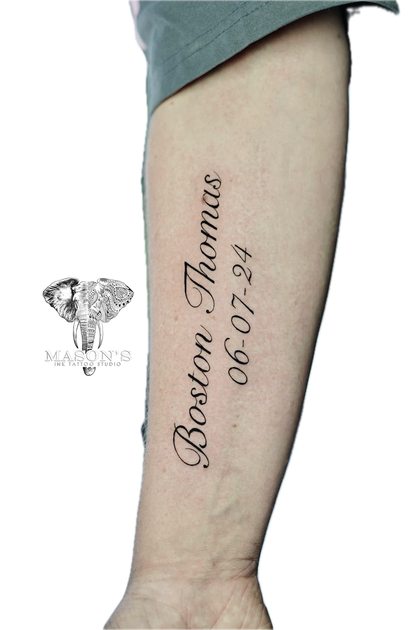 Fine Line Script Lettering Tattoo Design: a name and date written in cursive on a calf