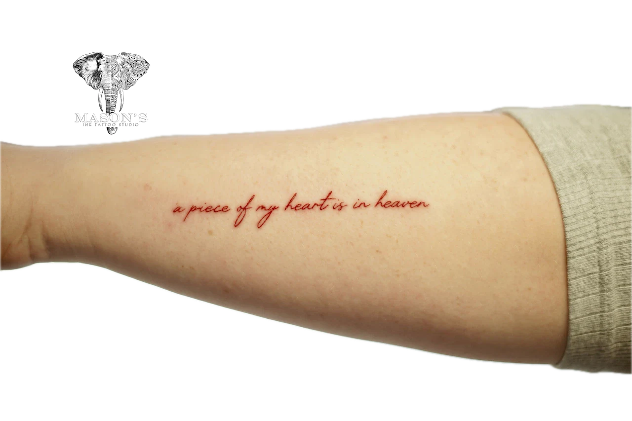 Fine Line Script Tattoo: a memorial phrase tattoo on the forearm