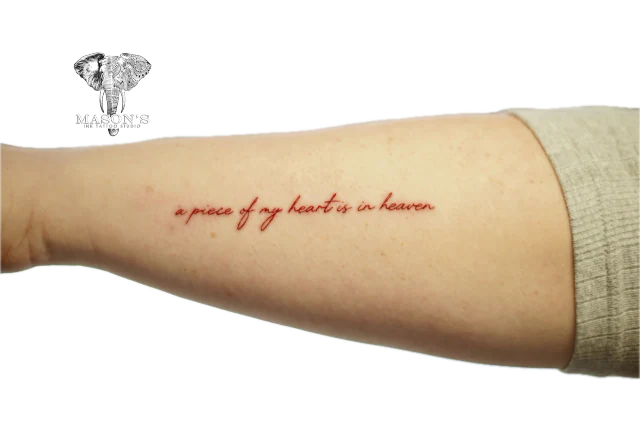 Fine Line Script Tattoo: a memorial phrase tattoo on the forearm