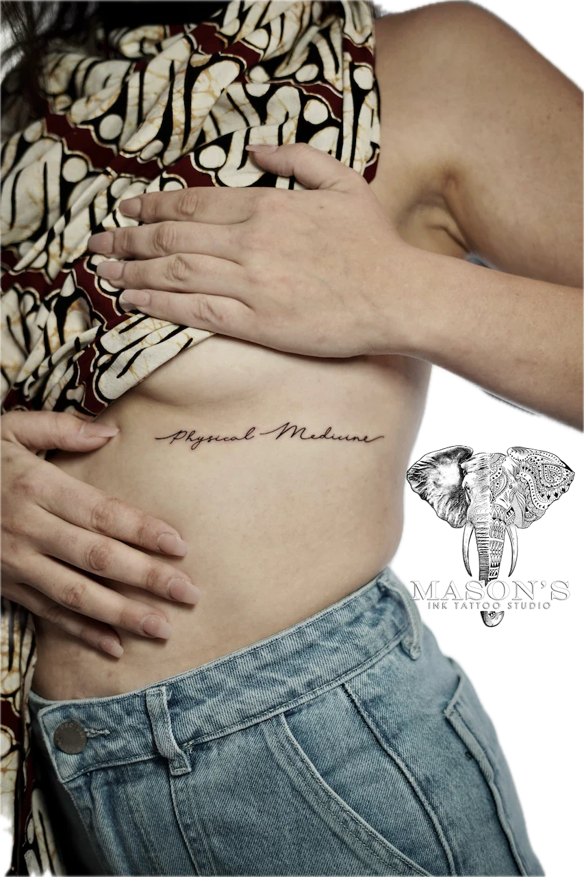 Fine Line Script Tattoo: Spiritual lettering tattoo on the stomach