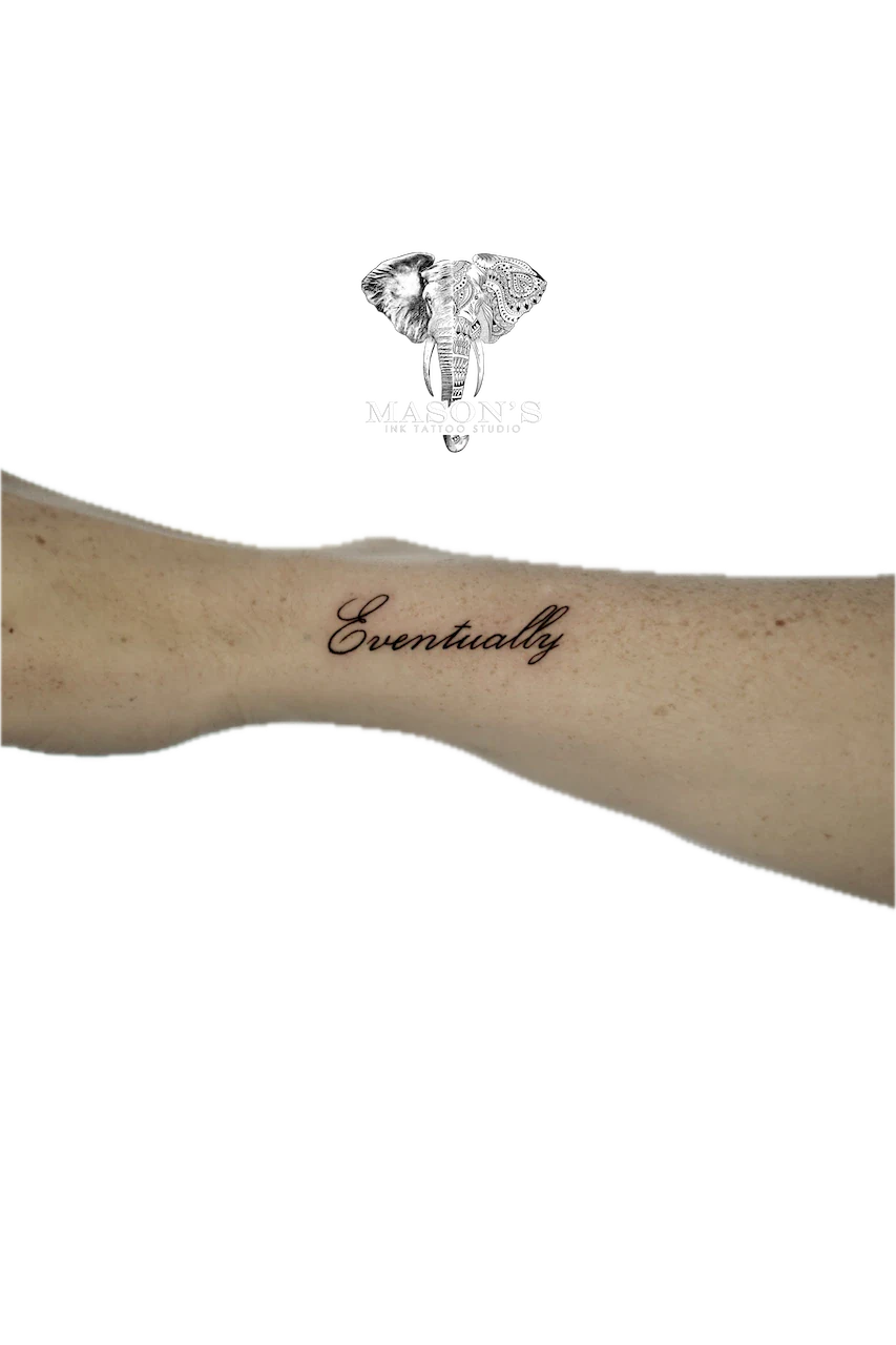 Fine Line Script Tattoo Design: Minimal black and grey lettering on the forearm