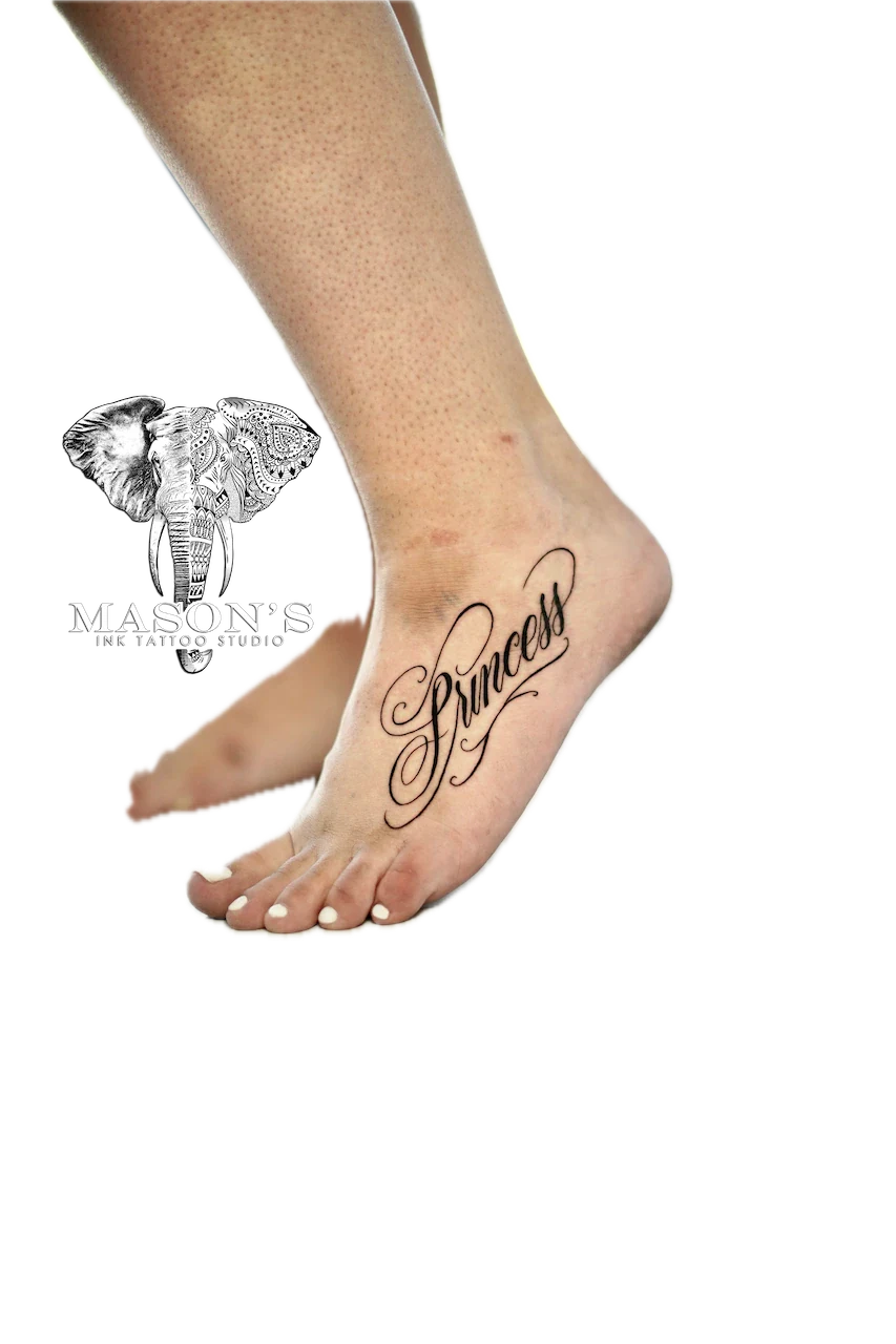 Fine Line Script Tattoo Design: Cursive lettering tattoo on the side of a foot