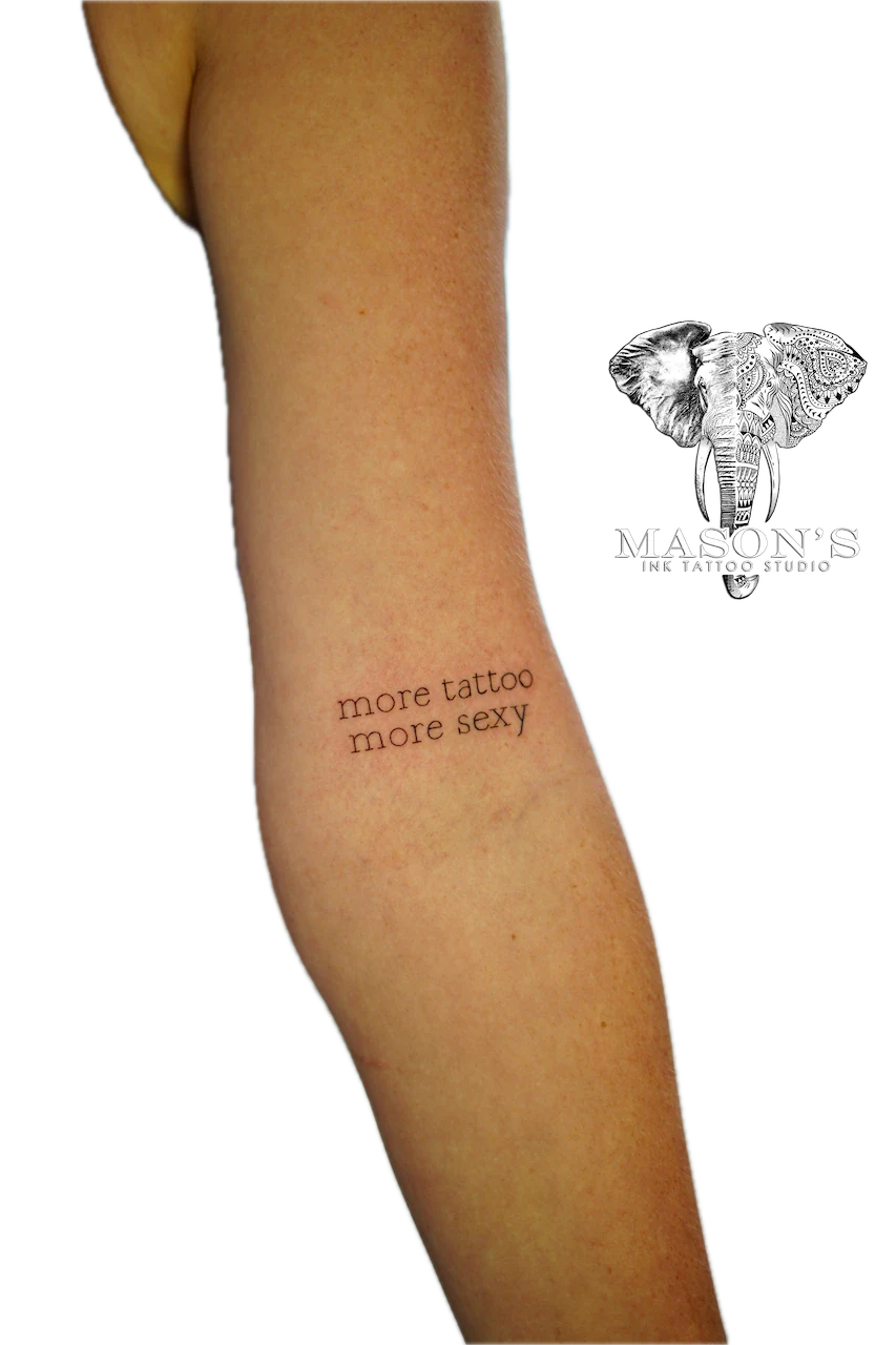Fine Line Script Tattoo Design: Minimal black and grey lettering on the forearm