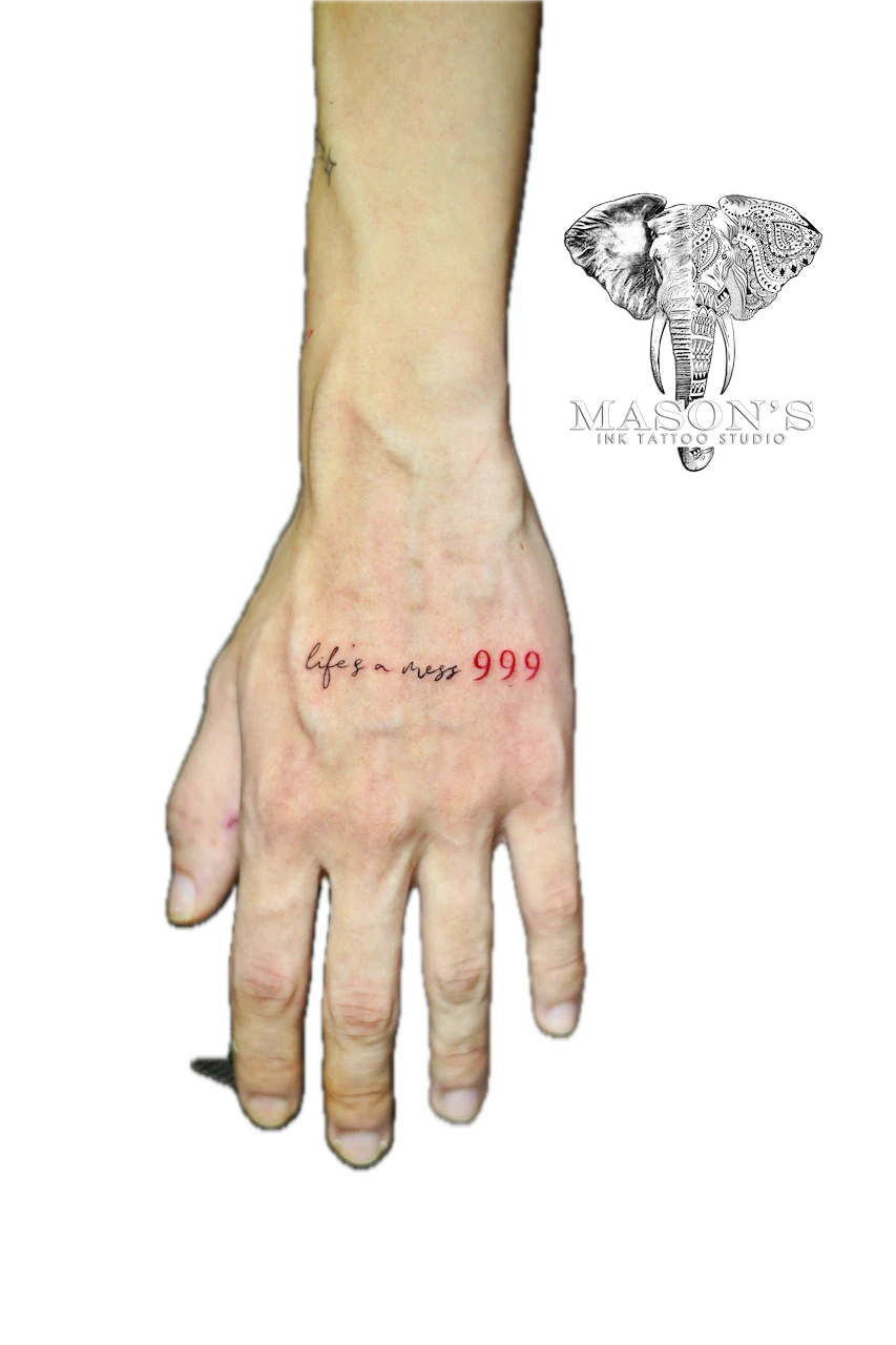 Fine Line Script Tattoo Design: Red lettering and numbers on the palm of a hand