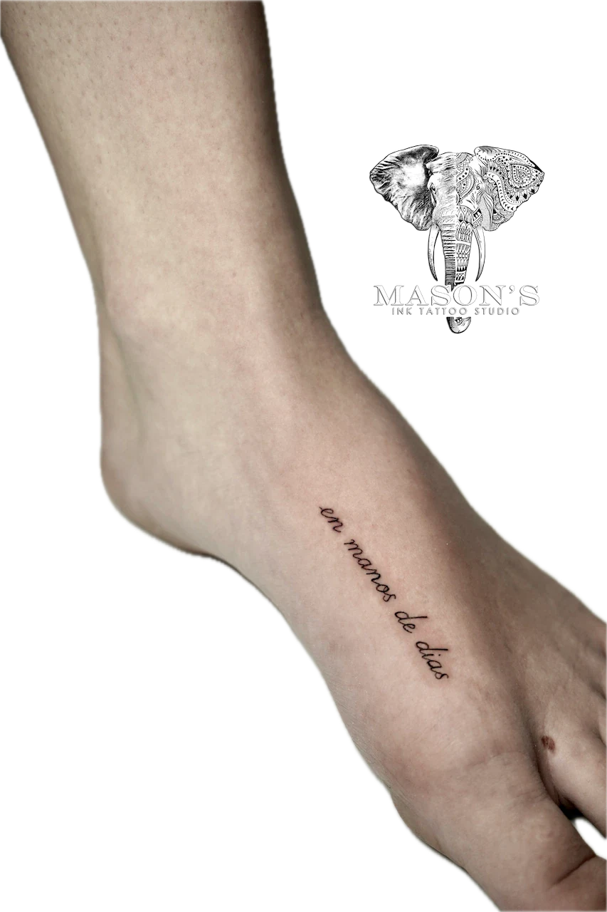 Fine Line Script Tattoo Design: Small script lettering on the calf
