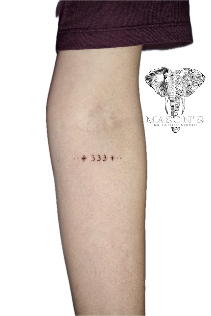 Fine Line Script Tattoo Design: Minimalist lettering tattoo with dots on the calf