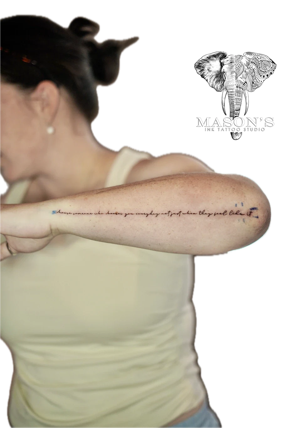 Fine Line Script Tattoo Design: a script tattoo on the forearm with a single dot