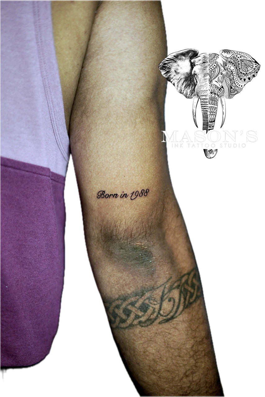 Fine Line Script Tattoo Style: a forearm tattoo with a date and a knot design