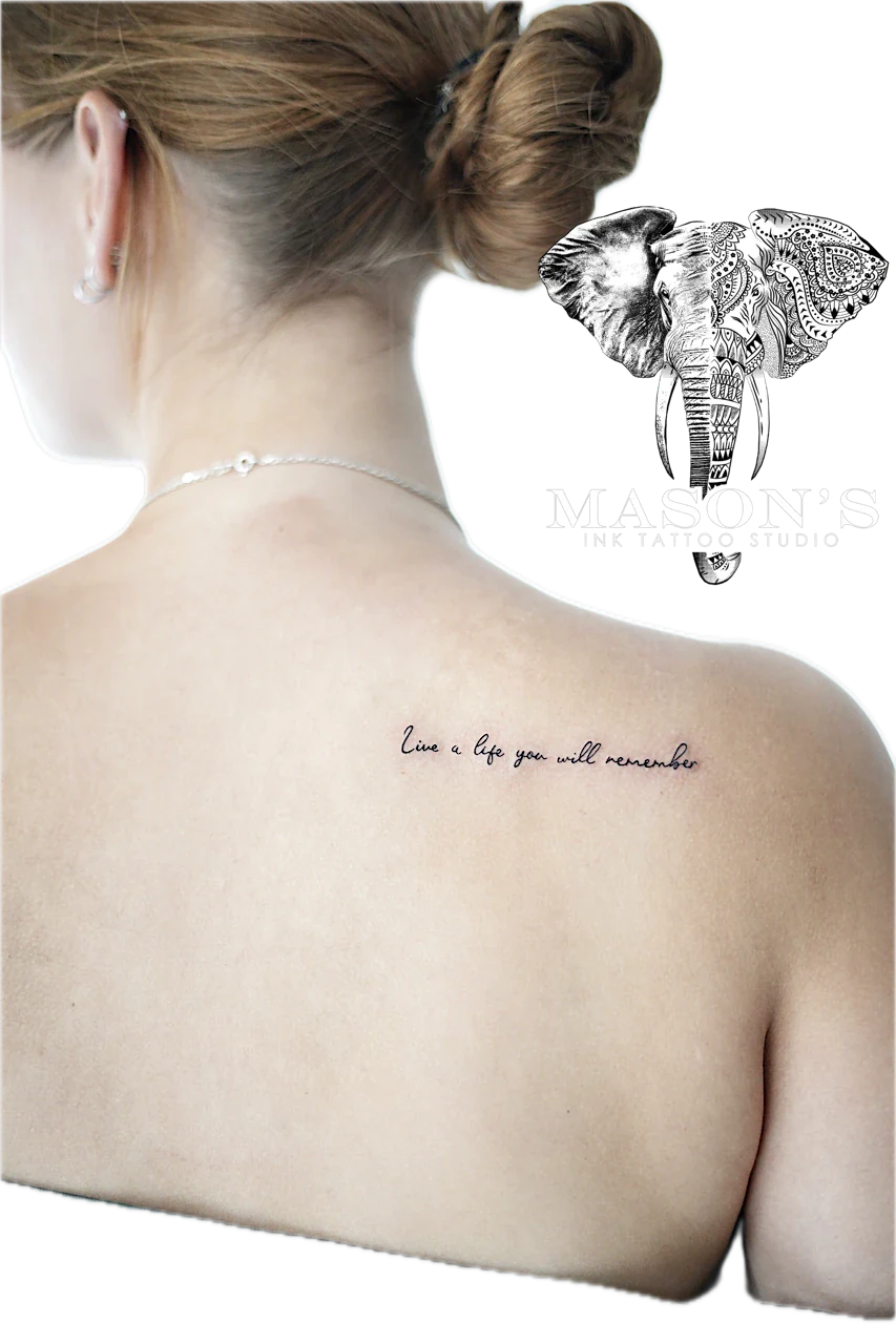 Fine Line Script Tattoo Style: Minimal script lettering on the back