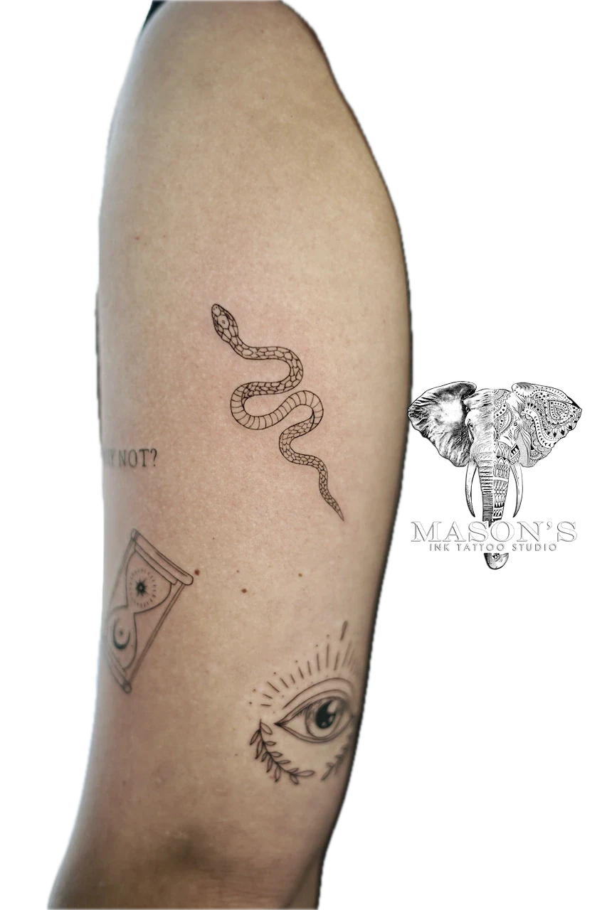 Fine Line Snake Tattoo Design: a minimalist forearm tattoo of a snake, eye, and hourglass