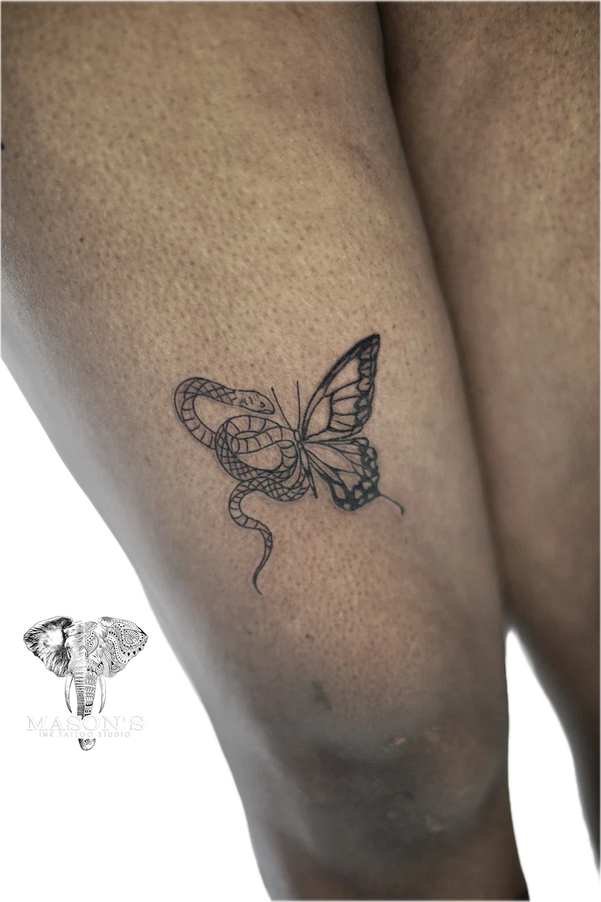 Fine Line Snake and Butterfly Tattoo - Fineline tattoo by Mason's Ink Tattoo Studio, Bali