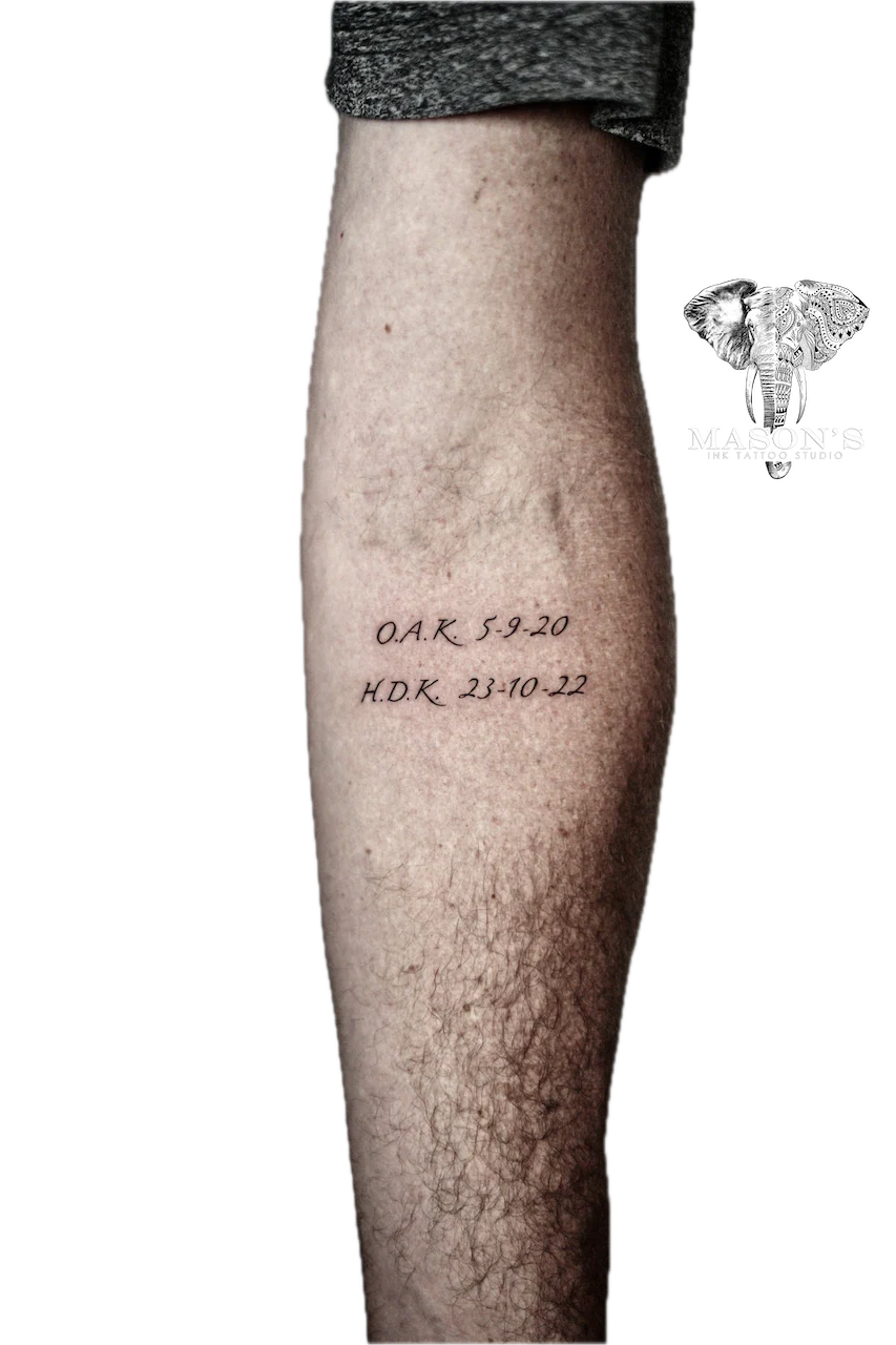 Fine Line Tattoo Design: Black and grey lettering on a calf
