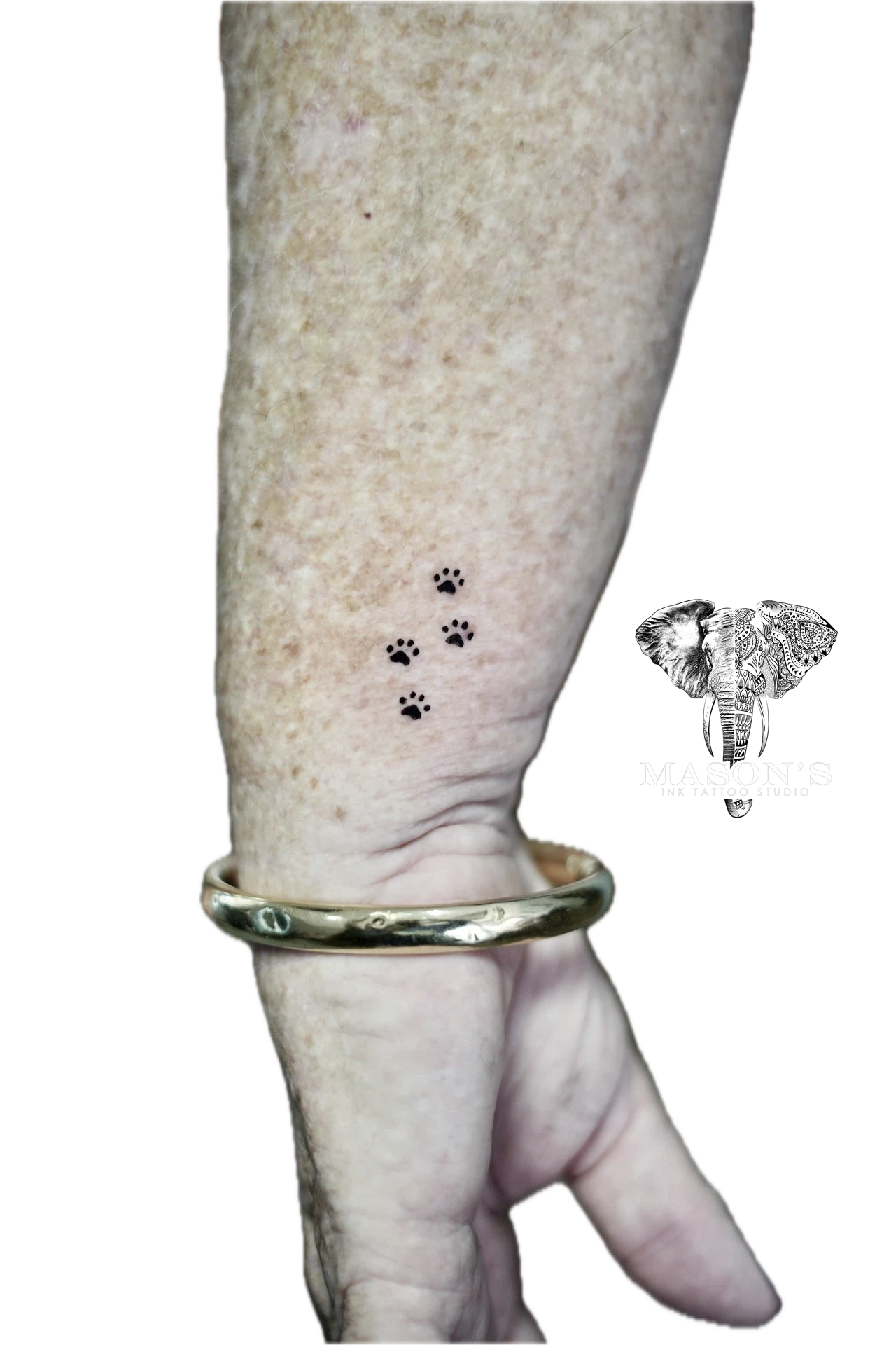 Fine Line Dog Paws Tattoo by Mason's Ink Tattoo Studio, Bali