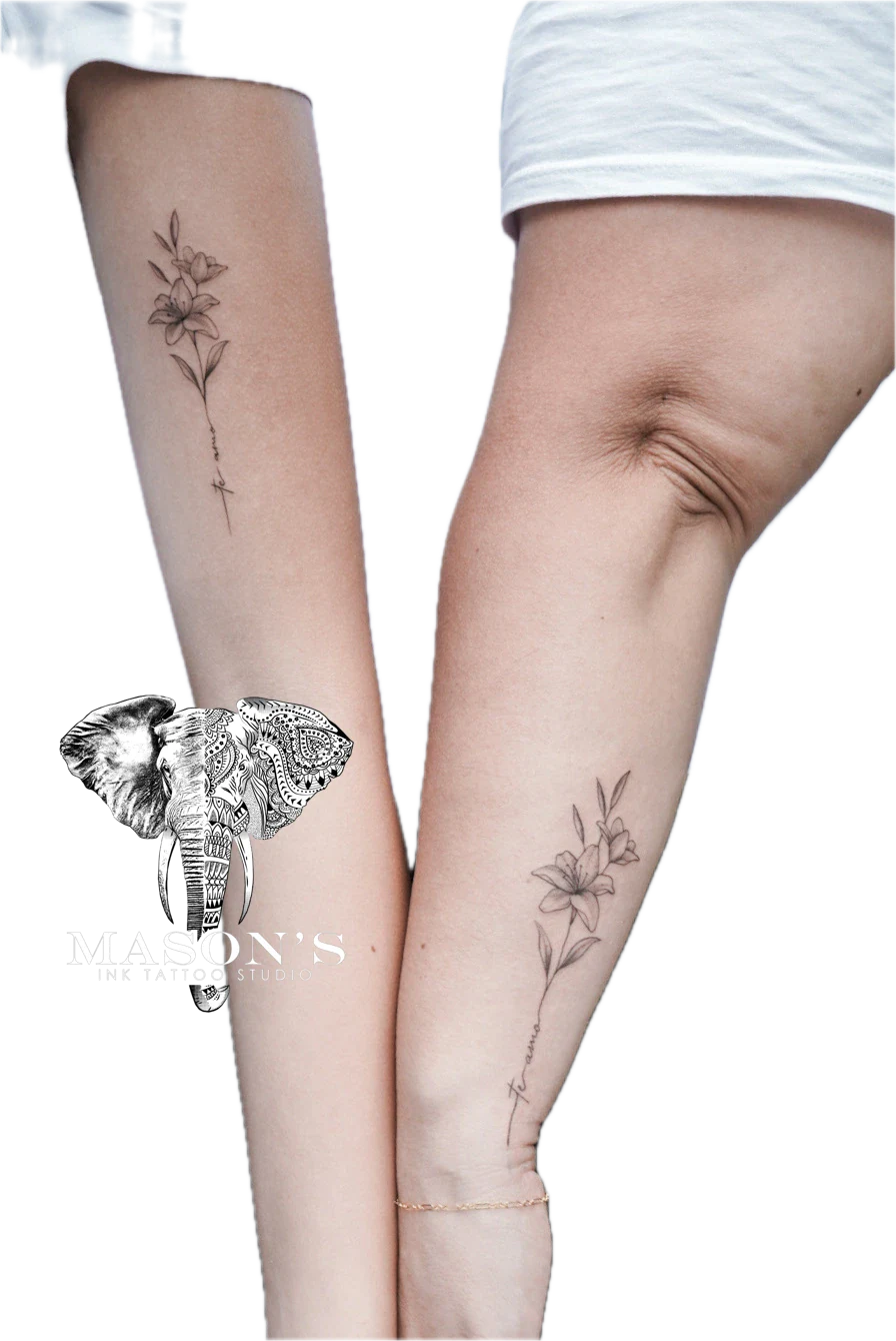 Floral Tattoo Style Design: Small black and grey floral tattoos on both calves