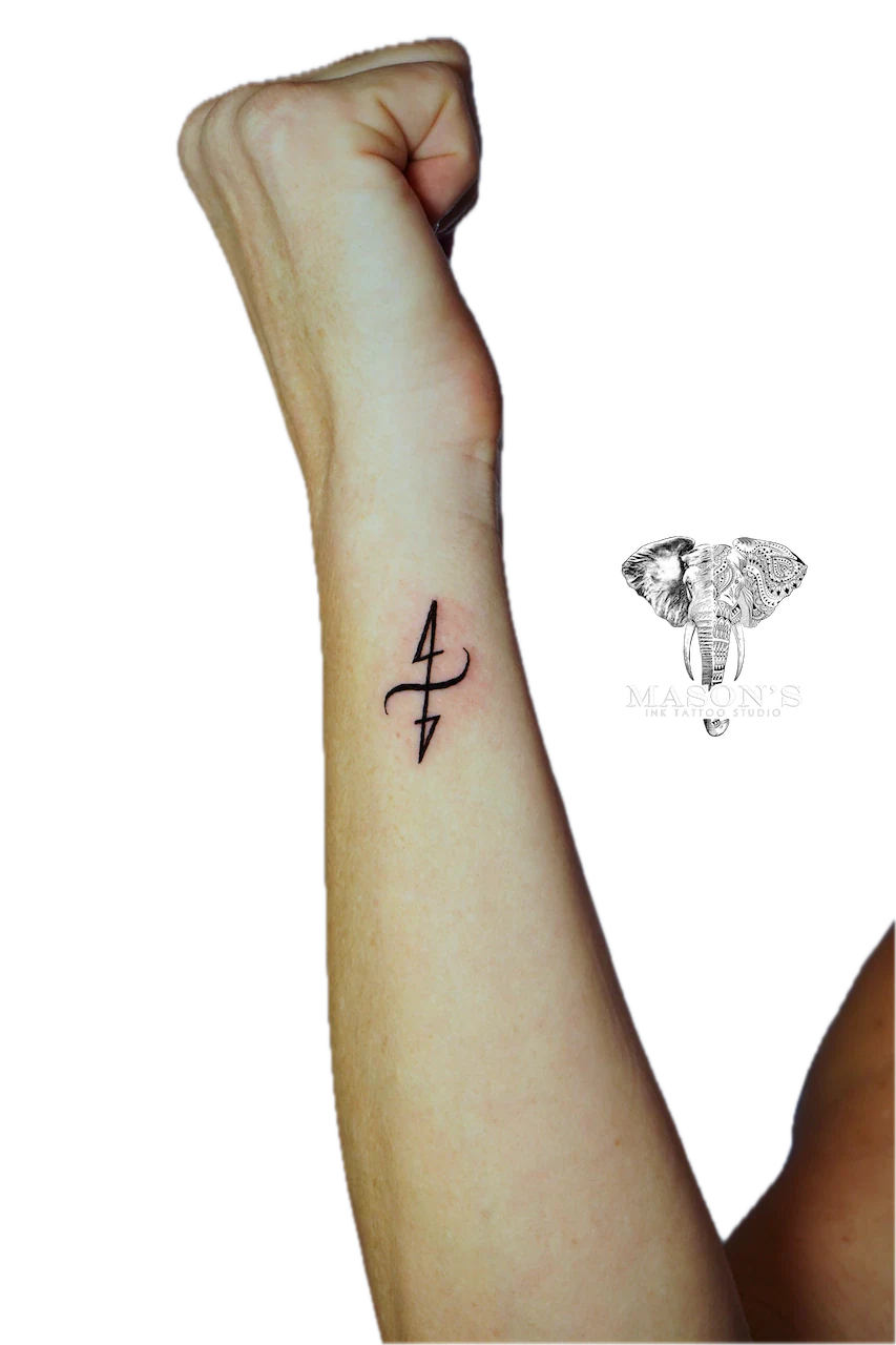 Minimalist Fine Line Symbol Tattoo - Fineline tattoo by Mason's Ink Tattoo Studio, Bali