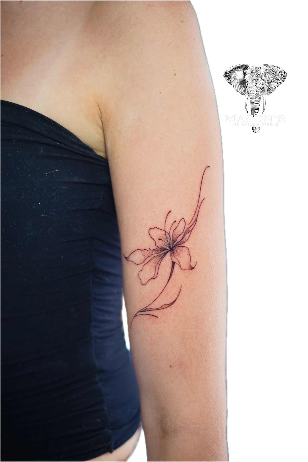 Fine Line Flower hand tattoo by Mason's Ink Tattoo Studio, Bali